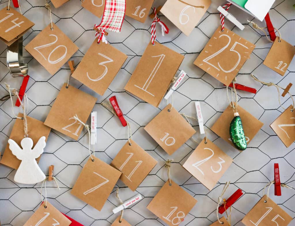 Our Christmas Activity Advent Calendar; everyday until Christmas, our toddler will open a hanging card to see what fun Christmas activity or adventure we will be doing that day! Chocolate free advent calendar idea!