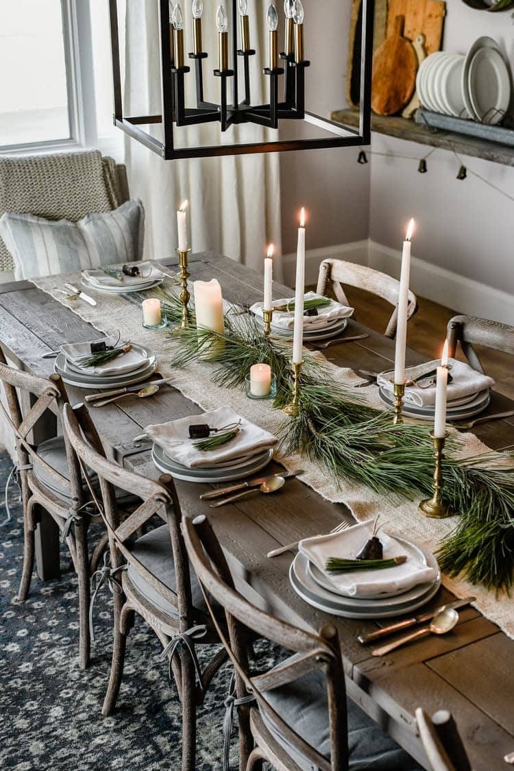 Gorgeous Farmhouse Christmas Table Setting Ideas You'll Want to Copy! - Here are simple yet elegant tablescapes for your to recreate this year! Centerpieces, dishware, lighting and more!