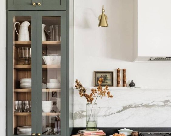 9 Pretty Green Kitchens; green cabinets, marble backsplash gold fixtures