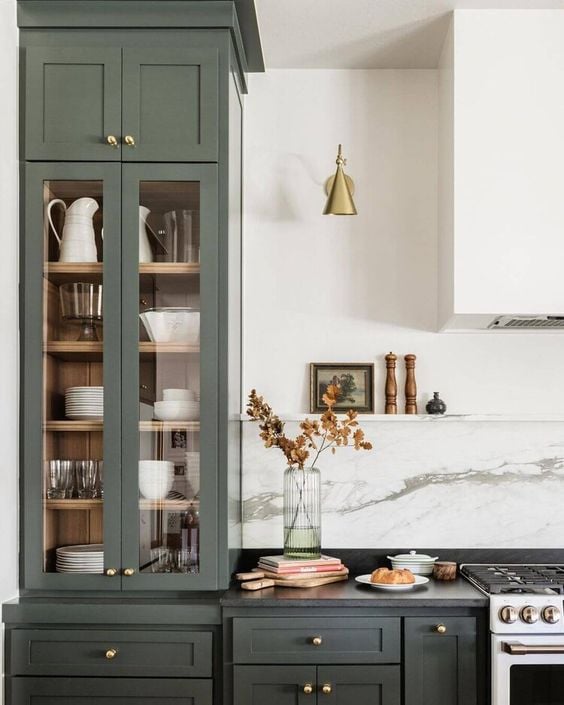 9 Pretty Green Kitchens; green cabinets, marble backsplash gold fixtures