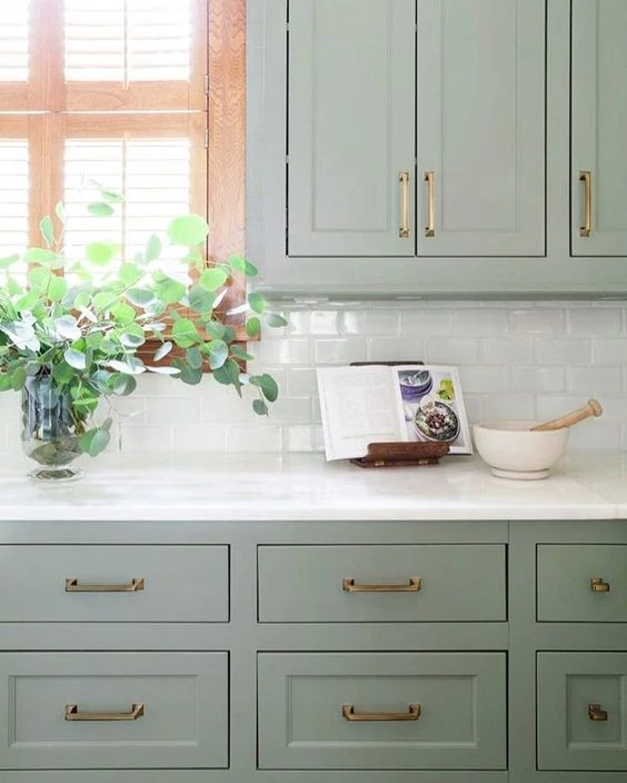 9 Pretty Green Kitchens; green cabinets, marble counters, light green cabinets