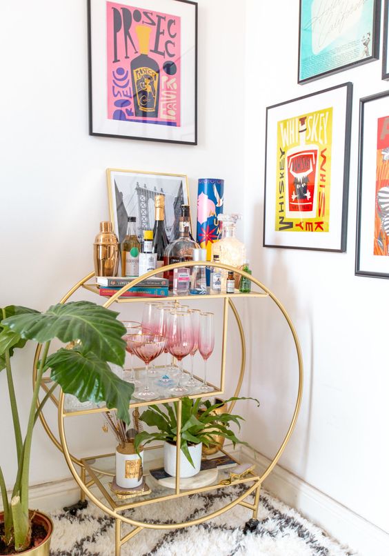 How to Create a Perfect Bar Cart That Will Have Your Guests Impressed! gold round bar cart