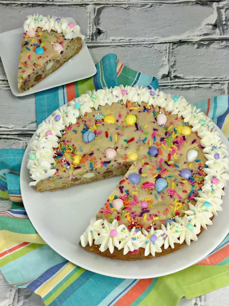 mini eggs easter cookie cake- 25 Creative Leftover Mini Eggs Recipes to Try This Easter; delicious and sweet recipes using extra Cadbury mini eggs - Baked goods, sweets, and cakes!