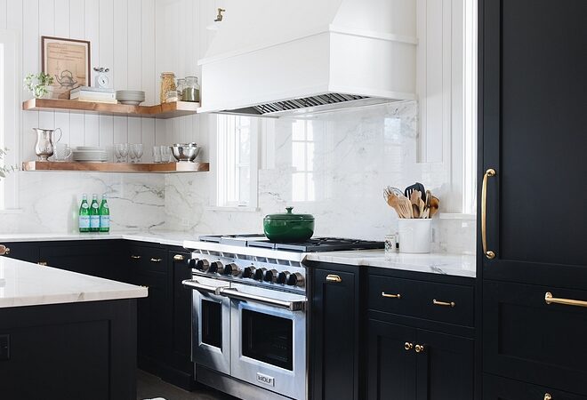 black kitchens, black kitchen cabinets, white range hood, open shelving in kitchen
