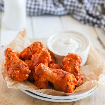 Garlic Buffalo Chicken Wings - These buffalo chicken wings pack quite a bit of garlic punch. They're spicy, but if you're a garlic lover, this easy appetizer recipe is for you.