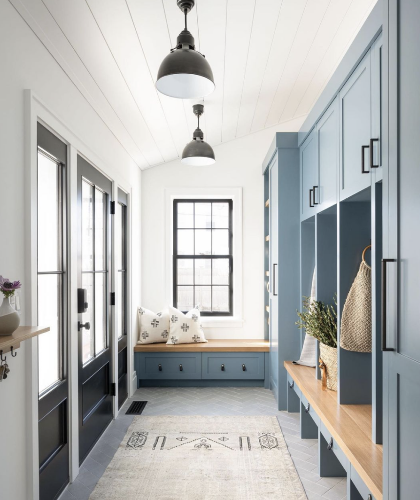 39 Tips to Decorate a Mudroom on a Budget; light blue mudroom, blue cabinets, shiplap
