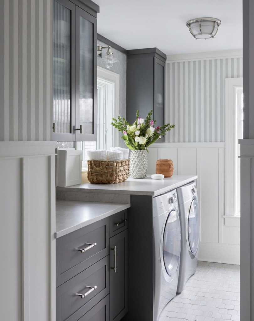 Laundry Room Essentials; grey cabinets, board in batten with striped wallpaper