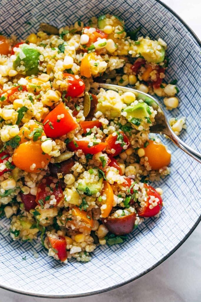 corn avocado and quinoa salad - What to Serve with Shredded BBQ Chicken; here are food + drink recipes and ideas to pair with your favourite shredded BBQ chicken!