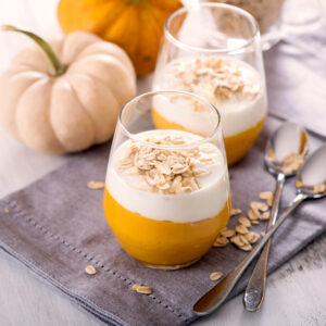 Healthy Coconut Pumpkin Smoothie Recipe; made with pumpkin puree, frozen banana, nut butter, coconut milk and topped with coconut yogurt! A delicious healthy breakfast or snack