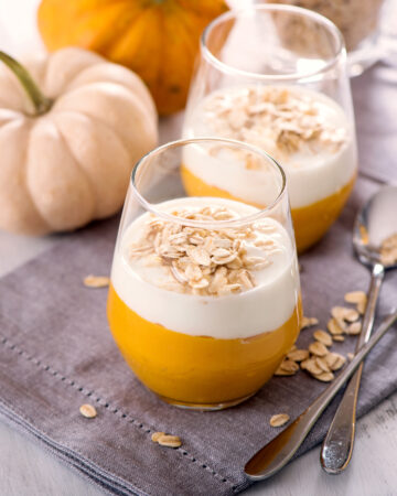 Healthy Coconut Pumpkin Smoothie Recipe; made with pumpkin puree, frozen banana, nut butter, coconut milk and topped with coconut yogurt! A delicious healthy breakfast or snack