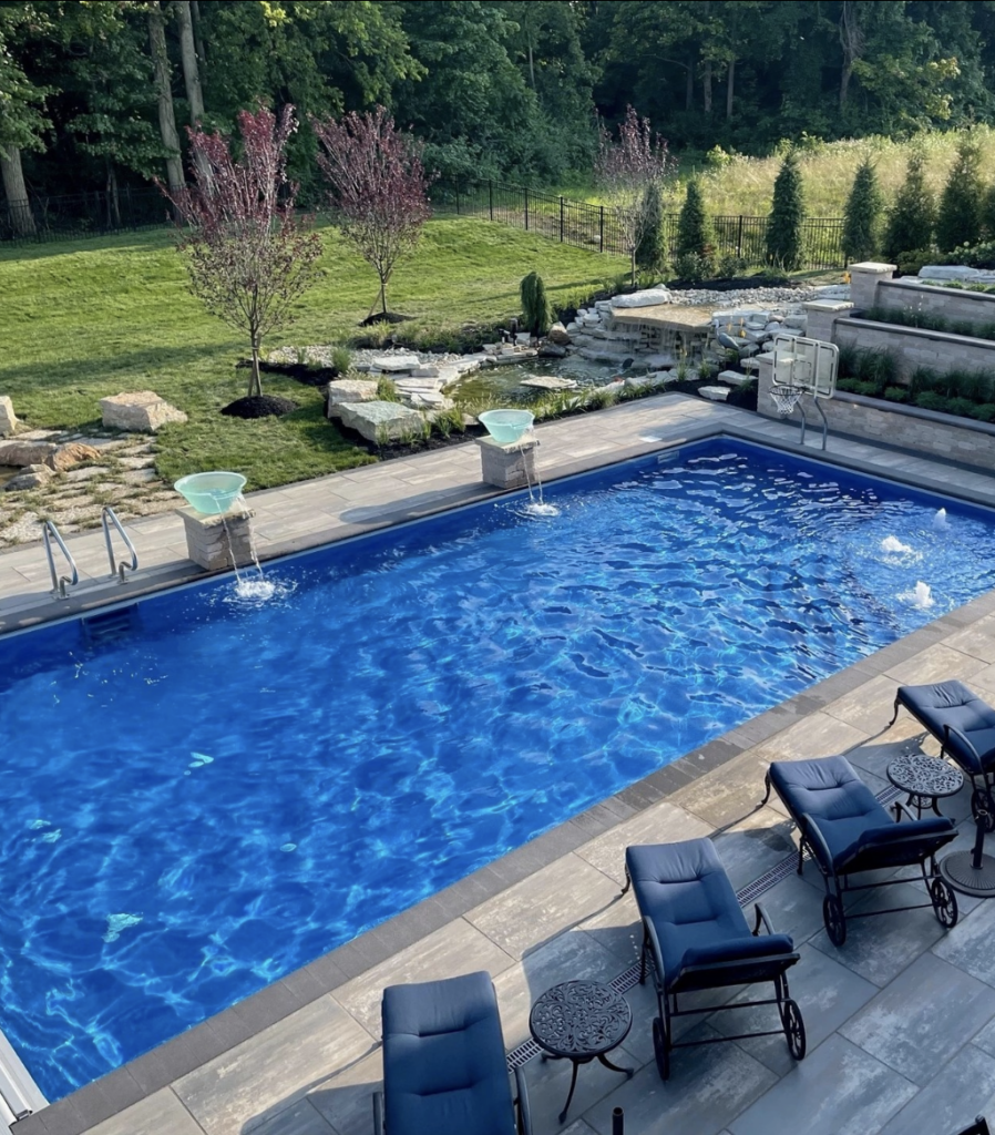 Beautiful Hillside Pool Ideas with Retaining Walls; pools on hill design with masonry stone retraining wall ideas.