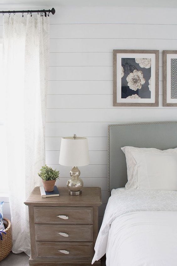 White shiplap wall in bedroom, shiplap accent wall
