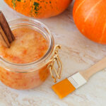 DIY Pumpkin Spice Sugar Scrub; This pumpkin sugar scrub is perfect for fall weather. Keeps your skin feeling soft and fresh with only a few natural ingredients! Easy homemade body product!