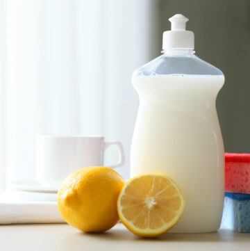 Homemade Lemon Liquid Dish Soap Recipe; easy homemade dish soap recipe with lemon essential oil, vinegar and sal suds!