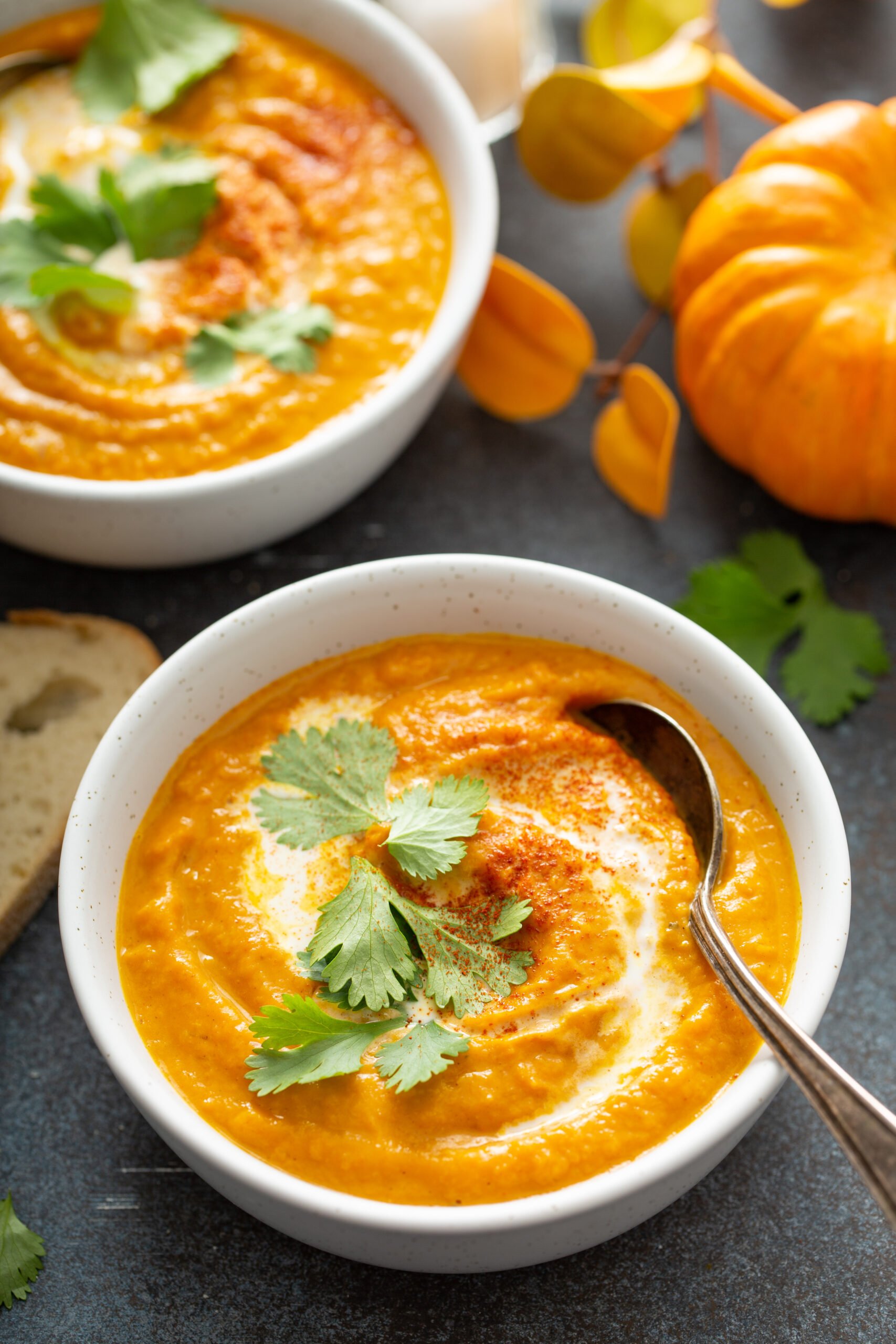 Thai Pumpkin and Carrot Soup Recipe; delicious 4 ingredient homemade soup recipe with thai curry, pumpkin, carrots and coconut milk! Vegan, dairy free, gluten free!