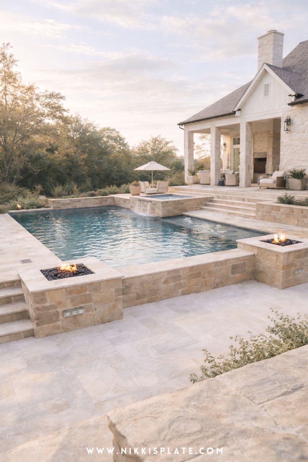 Hillside pool with retaining walls, stone design, and built-in fire features for a modern sloped backyard