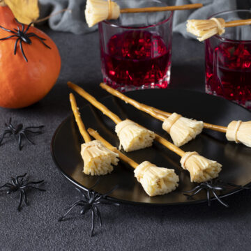 Cheese Broomsticks (Healthy Halloween Snacks); simple kid friendly snack for Halloween using string cheese and pretzels.