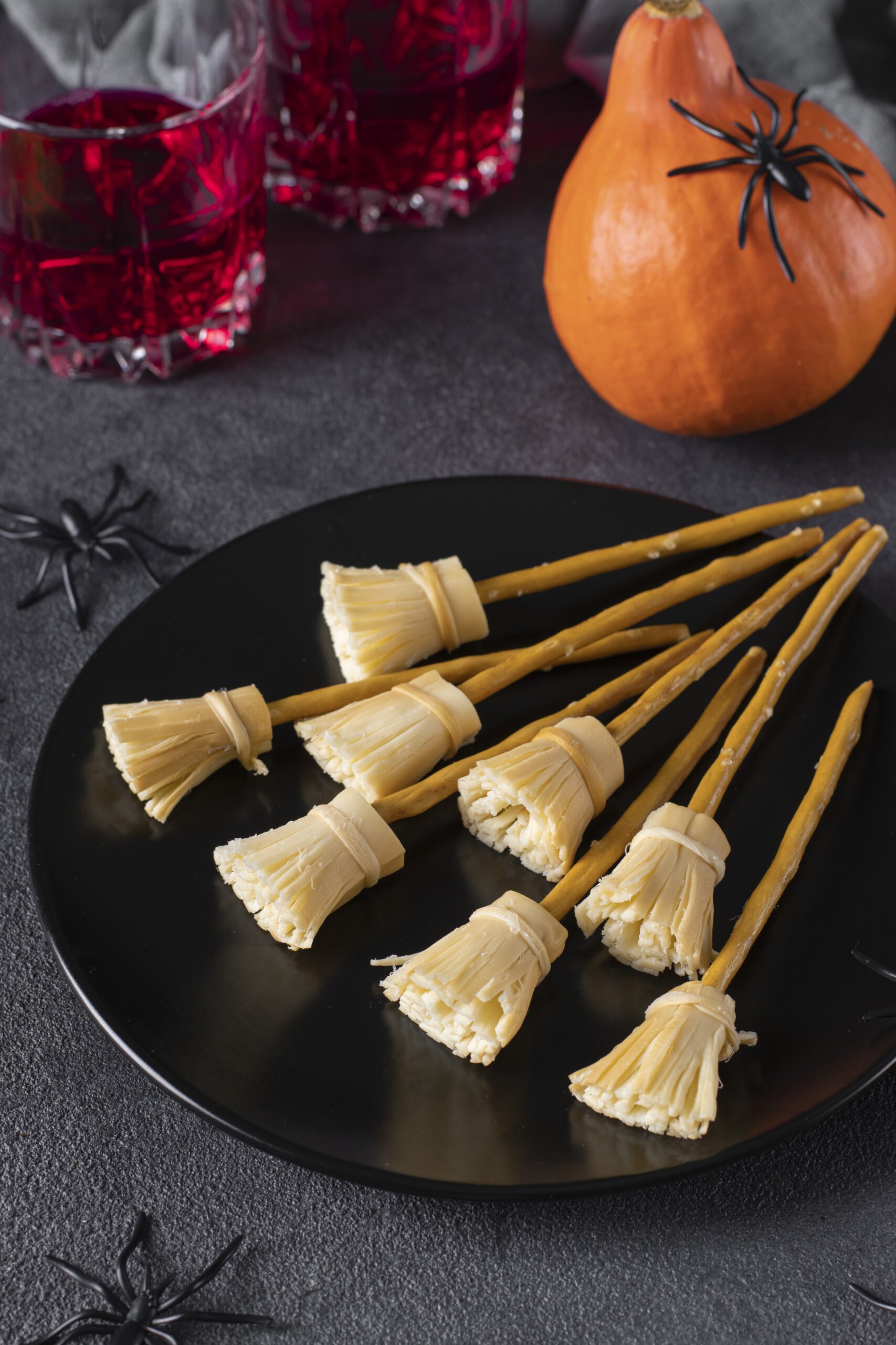 Cheese Broomsticks (Healthy Halloween Snacks); simple kid friendly snack for Halloween using string cheese and pretzels.