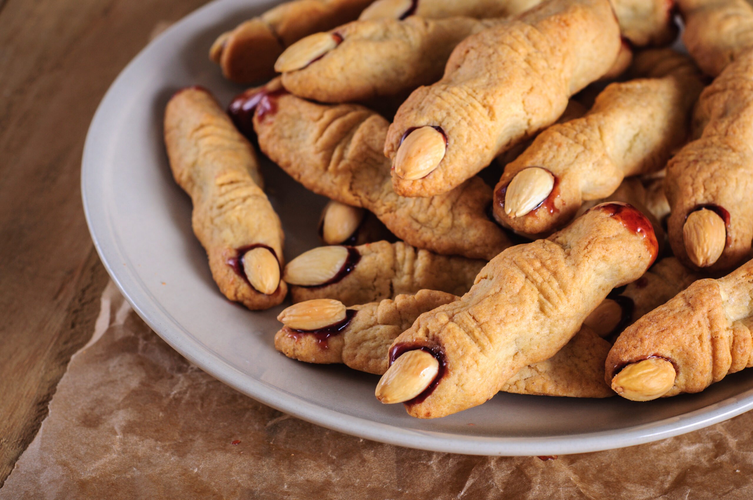 Easy Halloween Witch Finger Cookies (Using Store Bought Dough) - this is the easiest way to make this spooky witch finger cookie recipe for Halloween fun! Great for kids and for parties.