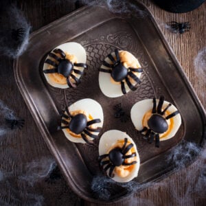 Halloween Spider Deviled Eggs; a fun and easy Halloween appetizer or snack made with eggs, mayonnaise and black olives! These are nut free, gluten free and can be dairy free!