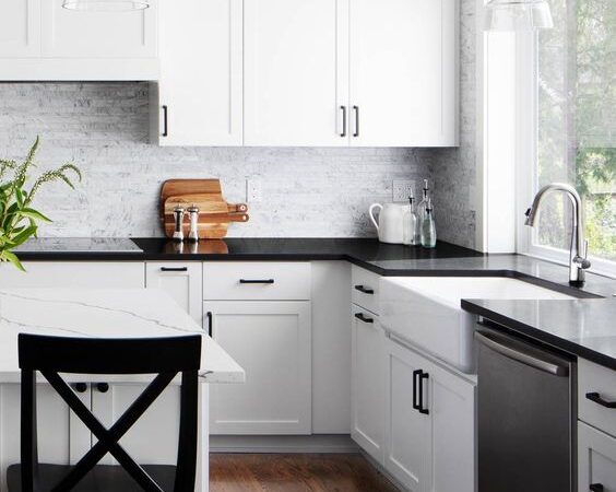 Black Quartz Countertops in white kitchen