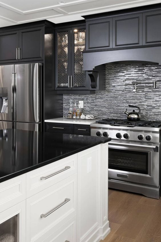Black and white small kitchen ideas, with black quartz countertops,