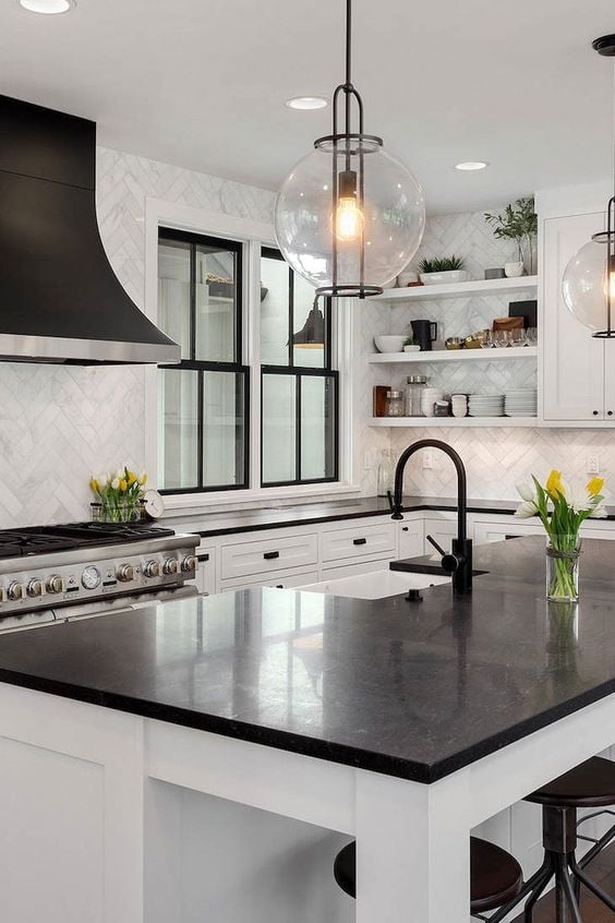 Black Quartz Countertops in white kitchen