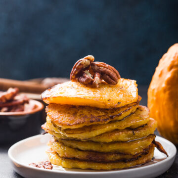 Easy Pecan Pumpkin Pancake Recipe; A delicious twist on your traditional pumpkin pancake recipe, with a sweet and salty pecan kick.