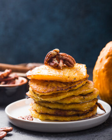 Easy Pecan Pumpkin Pancake Recipe; A delicious twist on your traditional pumpkin pancake recipe, with a sweet and salty pecan kick.
