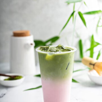 Iced Strawberry Matcha Latte Recipe made with coconut milk, match powder and strawberry puree!