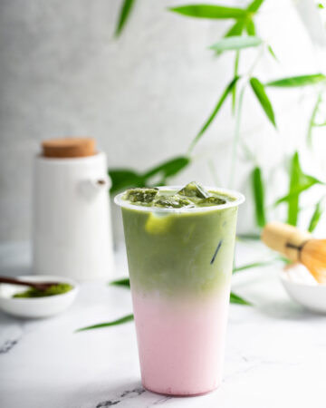 Iced Strawberry Matcha Latte Recipe made with coconut milk, match powder and strawberry puree!