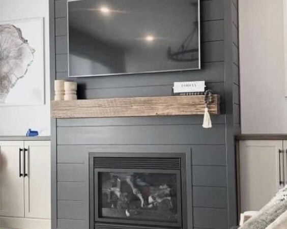 Charcoal Shiplap Fireplace with wood mantel and built-ins