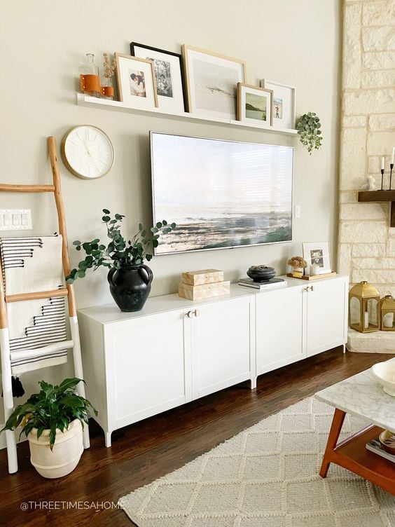 40 TV Stand Decor Ideas to Elevate Your Living Room; Here are ways you can decorate your TV stand to make watching TV that much more enjoyable!