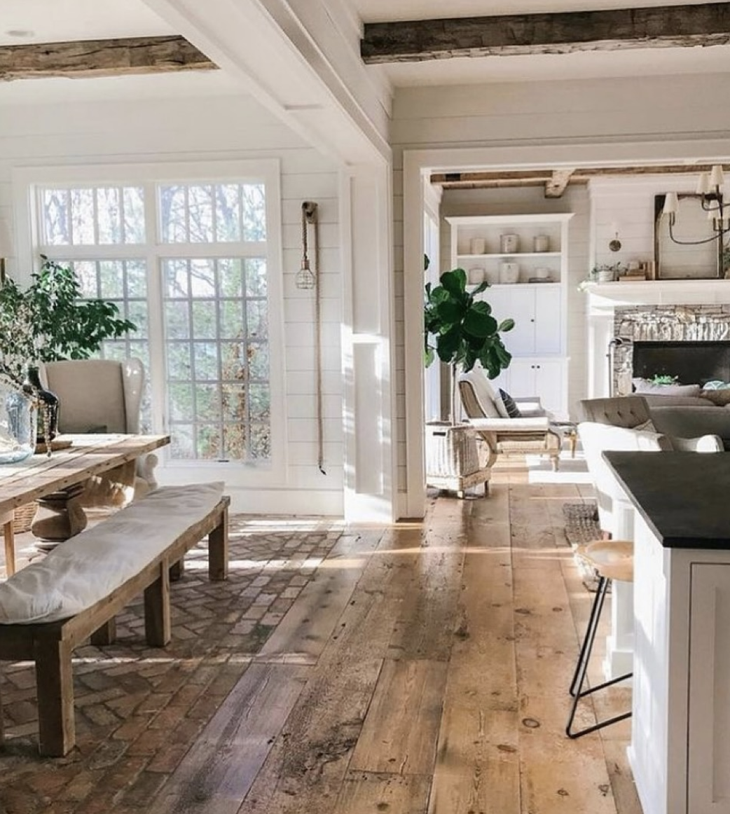 rustic wide plank wood flooring in bright modern farmhouse living room
