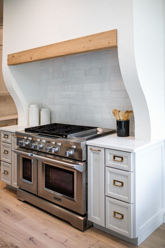 Plaster Farmhouse Range Hood Ideas to Create the Perfect Kitchen; Here is a collection of farmhouse wood range hoods for your next kitchen design!