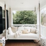 Here are 25 farmhouse porch swings for a welcoming and cozy entry way! All the farmhouse porch swing ideas you need in one place!