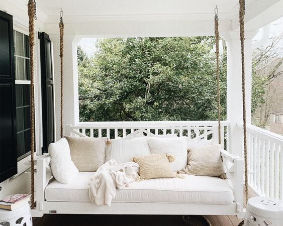 Here are 25 farmhouse porch swings for a welcoming and cozy entry way! All the farmhouse porch swing ideas you need in one place!