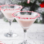 Christmas Candy Cane Martini Recipe; an easy festive alcoholic beverage to bring you all the Christmas feels! Bursting with candy cane peppermint to celebrate this holiday season!