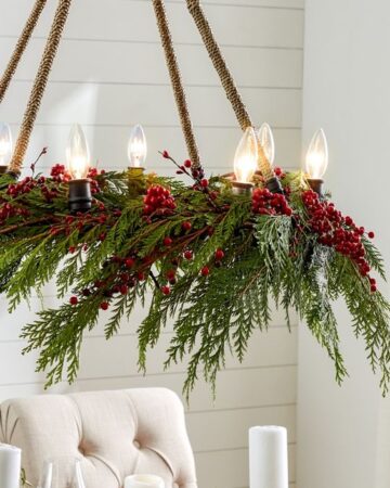 Chandelier Christmas Decor Ideas; a list of 40 festive chandelier Christmas decor ideas that are sure to add some sparkle to your dining room this holiday season!