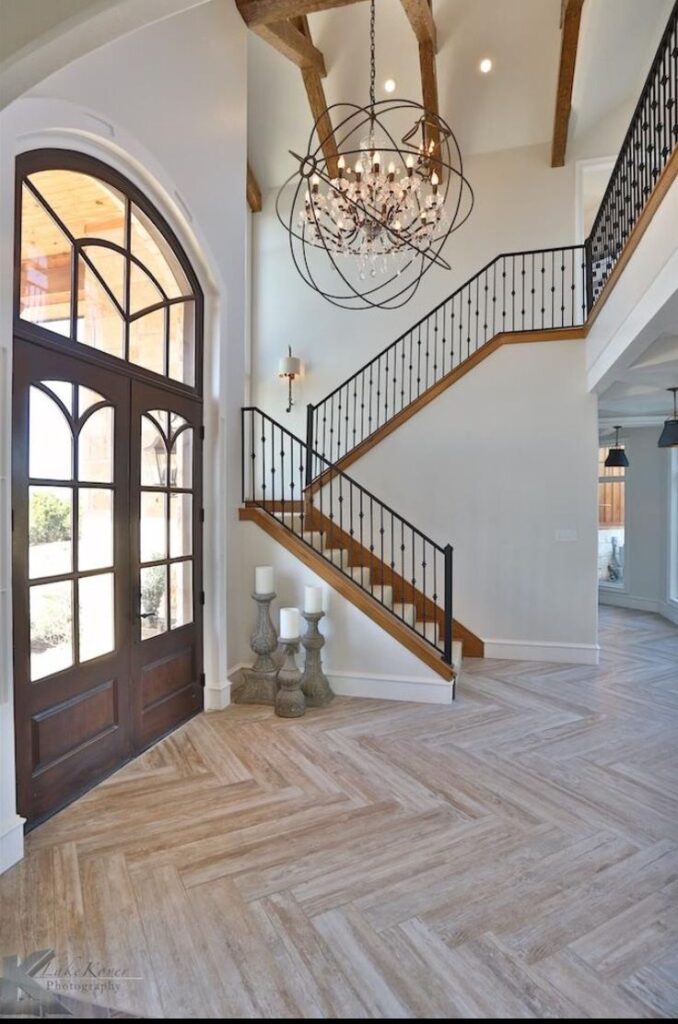 25 Two-Story Foyer Chandelier Ideas For a Grand Entry - Nikki's Plate