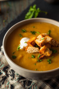 Easy Butternut Squash Soup Recipe; this creamy soup recipe is perfect for any cold day! Vegan and dairy free! Serve with bread for the ultimate experience.