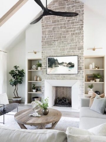 Fireplace Ideas With TV Above; Enjoy the warmth next to a burning fire while watching your favourite movie or show with these living room ideas!