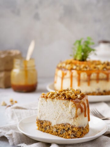 This Caramel Carrot Cheesecake has a carrot cake nutty base with a thick creamy caramel cheesecake topped with salted caramel and nuts.