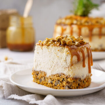 This Caramel Carrot Cheesecake has a carrot cake nutty base with a thick creamy caramel cheesecake topped with salted caramel and nuts.