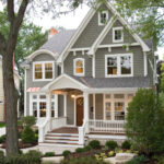 Top 10 House Exterior Trends; shutters, dark and white colors, lots of concrete, and more wood accents!