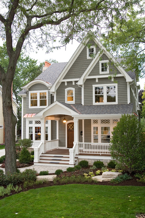 Top 10 House Exterior Trends; shutters, dark and white colors, lots of concrete, and more wood accents!