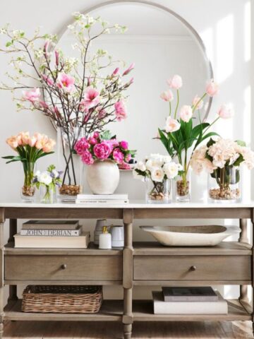 How to Decorate Your Entryway for Spring; Warm weather is on the way, and with it all the potential for beautiful flowers & bright colors. Here's how to bring springtime to your front door