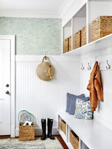 Tips for Organizing Your Mudroom; Creating an organized place to stash boots, hats, and the keys is the perfect way to end a busy day. Here are all the mudroom organization pointers you'll need!