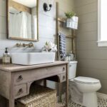 How to Create A Perfect Farmhouse Bathroom; antique vanity, green shiplap walls