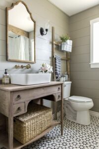 How to Create A Perfect Farmhouse Bathroom; antique vanity, green shiplap walls